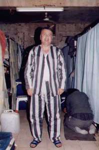 Kamal in prison uniform